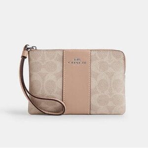 New COACH Corner Zip Wristlet In Signature Canvas With Stripe